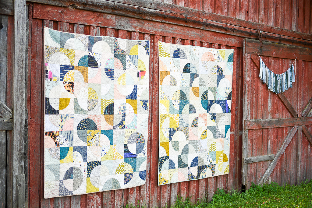 Double Time Quilts on a red barn 